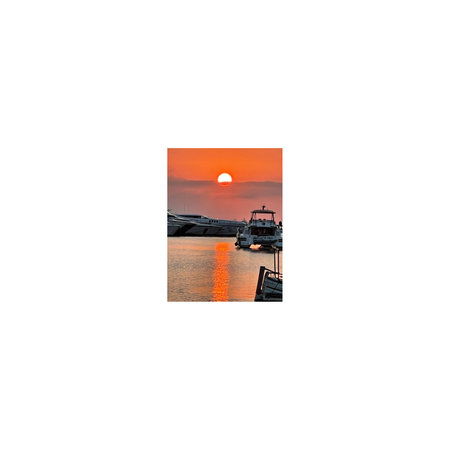 Photo collage of fishing boats in the sea at sunset. Collage.の写真素材