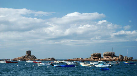 Ships and red granite rocksのeditorial素材