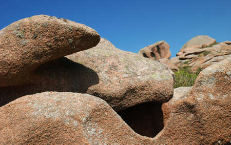 Rocky landscape on red granite coastの写真素材