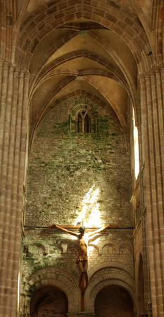 Crucifix and arcs in old cathedralのeditorial素材