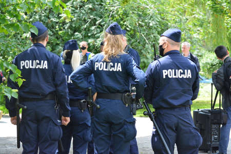 Policemen in blue uniforms on patrol duty.のeditorial素材