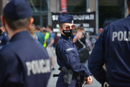 Securing a public meeting in WrocÅaw Rynek in 2020. Police, city guard.のeditorial素材