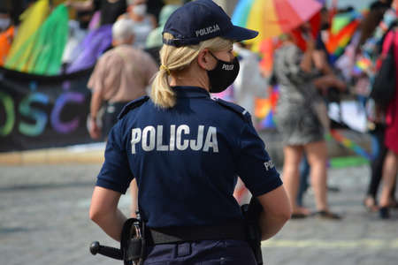 Securing a public meeting in WrocÅaw Rynek in 2020. Police, city guard.のeditorial素材