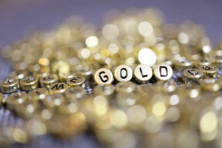 Inscription made of golden letters. Gold - gold.の写真素材