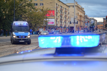 Traffic policeman in action on the street in Wroclaw.のeditorial素材