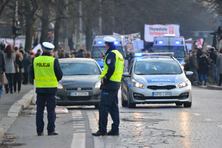 Traffic cops in action in the city with their cars.のeditorial素材