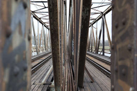 a rusty steel post-industrial structure in the town.の写真素材