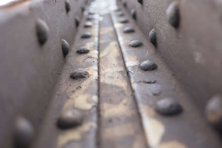 a rusty steel post-industrial structure in the town.の写真素材