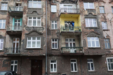 Old and dilapidated brick WrocÅaw tenement houses in the city center.の写真素材