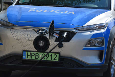 Electric car of the Polish police in the parking lot.のeditorial素材