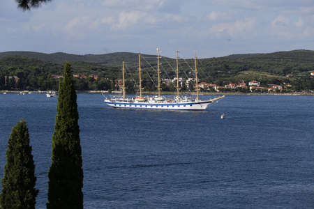 A beautiful sailing ship sails on the seas and oceans.