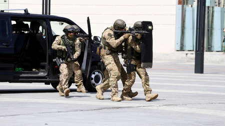 Policemen in anti-terrorist combat acacia.