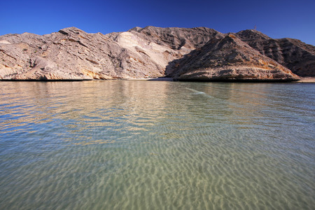 Shallow sea at Muscat,Omanの写真素材