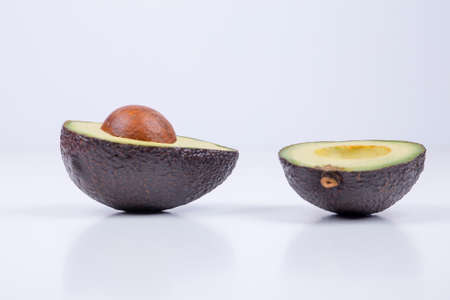 Avocado cut in half. Healthy organic food.