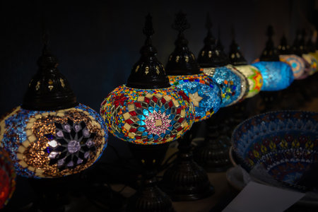 Various Turkish mosaic lamps with radiant red and blue glass tiles. For used interior design themed...