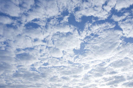 The blue sky with white cloudsの写真素材