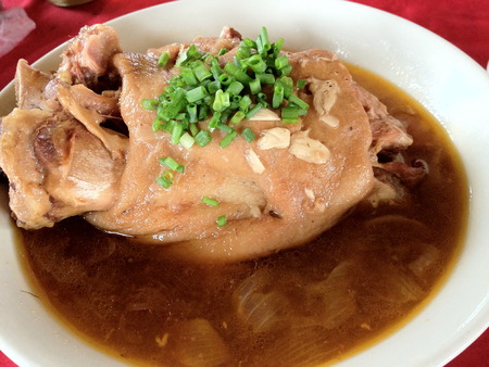 braised pig trotters with brown sauce chinese foodの写真素材