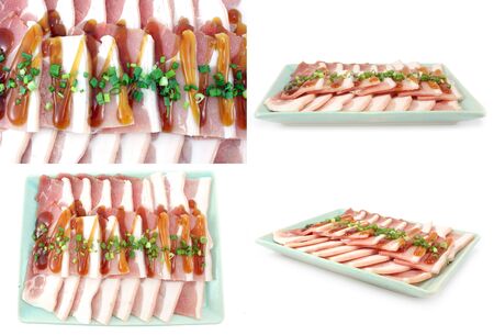 Bacon, streaky pork slice on white backgroundの写真素材