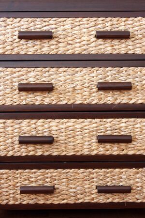 Rattan drawers in drawer cabinetの写真素材