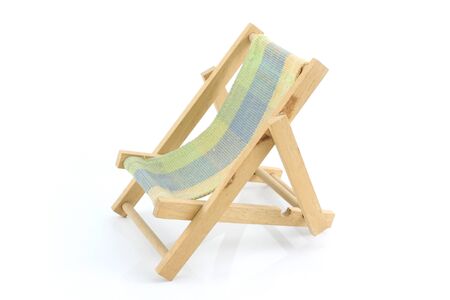 Wooden chaise lounge on a white backgroundの写真素材