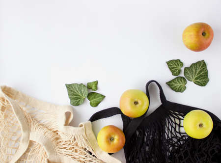 reusable bag of fruits With Green Apples on white background. Zero waste. Sustainable lifestyle concept plastic free.の写真素材