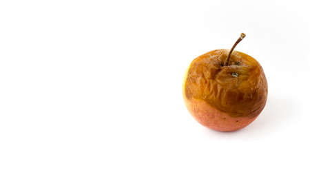 Rotten apple on a white isolated background.の写真素材