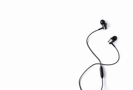 Black headphones on white isolated background. Space for text. Copy space. Flat lay.の写真素材