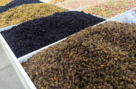 Various dried fruits For Sale At Market close up. Healthy foods.
