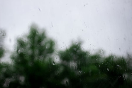 Raindrops on window , rainy day. Background raindrops. blurred background