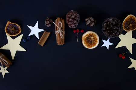 Christmas flatlay on black background.Happy New Year concept.Christmas decorations.の写真素材