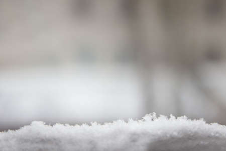 Winter banner with snow and blurred background. Selective focus. Winter banner or poster. Copy spaceの写真素材
