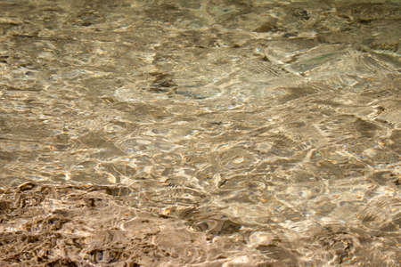 Sea surface sandy. Sparkling Sea Water. Close up Sea surface.の写真素材