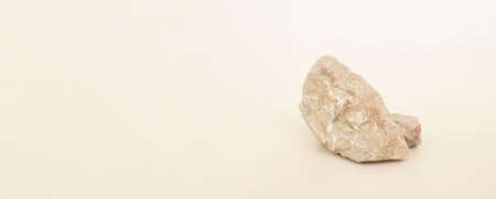 Background for cosmetic products in natural beige color. Stone podium. Banner, place for text.の写真素材