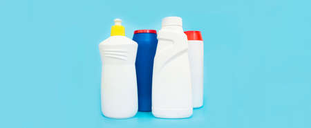 Variety house cleaning product on blue background with copy space. Empty cleaning suppliesの写真素材