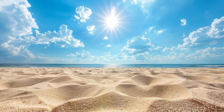 Close-up of beach sand against the background of the sea on a sunny bright summer day. High quality photoの素材
