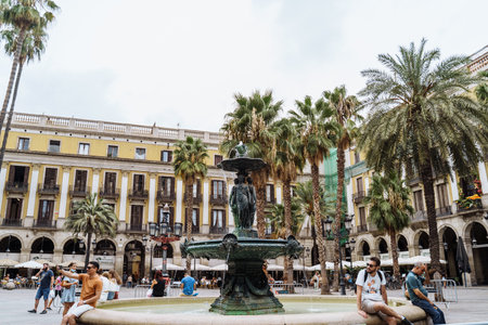Barcelona Spain September 2021. One of the most beautiful tourist spots in Barcelona with many cafes and palm trees is the Royal Plaza Real. Beautiful city. Nice walks along the narrow old streetsのeditorial素材