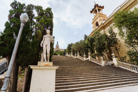 Barcelona Spain. Square of Spain and world famous magic fountain, Art museum of Catalonia. Sunny day in beautiful city. Nice stairs with statuesのeditorial素材