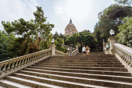 Barcelona Spain. Square of Spain and world famous magic fountain, Art museum of Catalonia. Sunny day in beautiful city. Nice stairs with statuesのeditorial素材