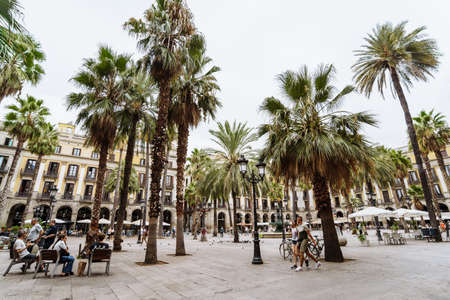 Barcelona Spain September 2021. One of the most beautiful tourist spots in Barcelona with many cafes and palm trees is the Royal Plaza Real. Beautiful city. Nice walks along the narrow old streetのeditorial素材