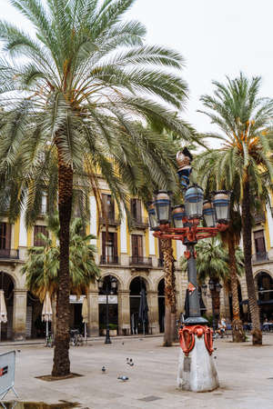 Barcelona Spain September 2021. One of the most beautiful tourist spots in Barcelona with many cafes and palm trees is the Royal Plaza Real. Beautiful city. Nice walks along the narrow old streetのeditorial素材