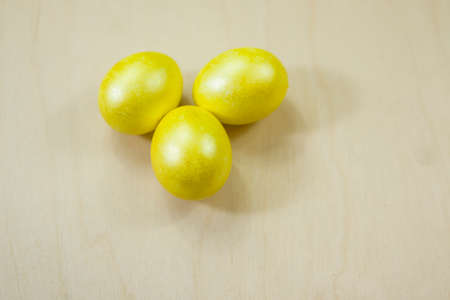 Spring festival when the family gets together to dye eggs in different colors.の写真素材