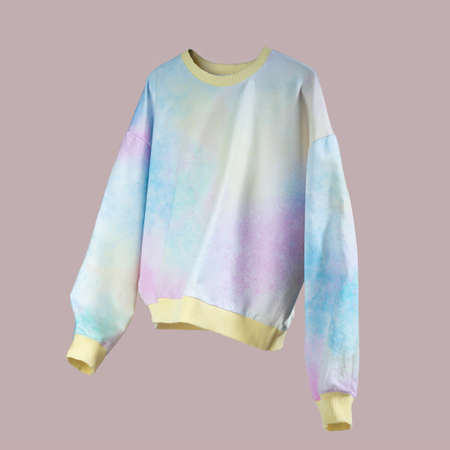 Pink Yellow Blue flying women's winter hoodie on pink background. Creative clothing concept, trendy fall winter cozy sweater. Women's fashion, autumn discounts. black Friday. Shoppingの写真素材