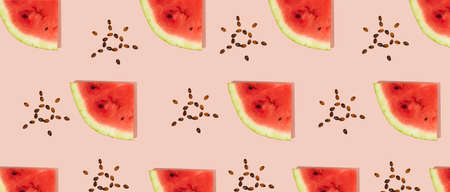 Pattern of sliced fresh watermelon, sun shaped seeds on pink background. Summer fruit, berry....