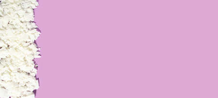 Extra Wide Banner with equipment, tools for candles making.organic soy wax flakes in a pink background. Cruelty-free vegan product. Handmade candles, diy, hobby idea. Flatlay. Copy spaceの写真素材