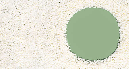 Organic soy wax on green background with copy space for design, text. Top view. frame border of...