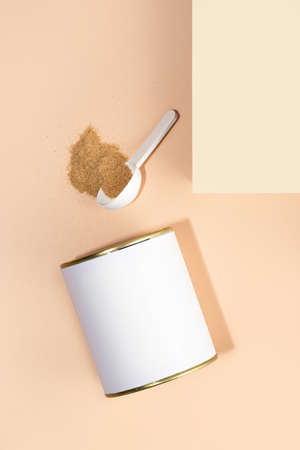 Glass bottle with softgels and Omega-3 capsules lying on a white background. Caustics light, sunlight. fish oil pills. Medical support and treatment. Biologically active additives. copy space. Bannerの写真素材