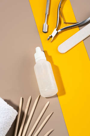 A package of anti-cellulite dry scrub lying on an orange background. Body scrub with essential oils of lime, coffee and mandarin. Cosmetic product for peeling and spa care, body beauty. copyspace.の写真素材