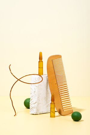 Male hands holding cosmetic ampoules with serum for hair growth, beauty hair restoration in a modern bright bathroom. Concept Hair loss, the problem of male baldness. lifestyle.の写真素材