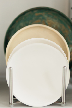 ceramic mug made on a Potter's wheel in the studio. Workshop on modeling on the potter's wheel.の写真素材