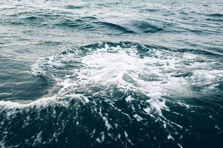 dark blue sea water background, shades of blue in black sea, nature backgroundの写真素材